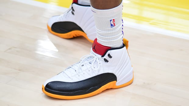 Los Angeles Lakers forward Rui Hachimura's white and black Air Jordan sneakers.